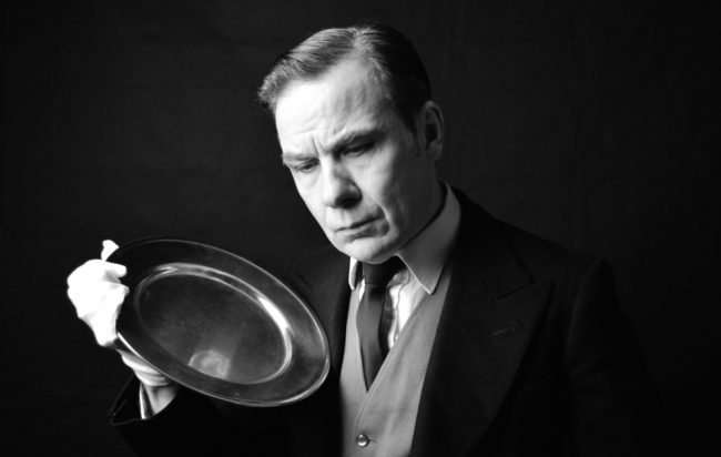 image of man holding a plate